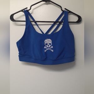 Bright blue Lululemon sports bra with skull design - size 10